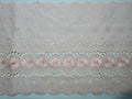 Cream broderie anglaise lace with delicate floral embroidery and scalloped edge, 200mm wide
