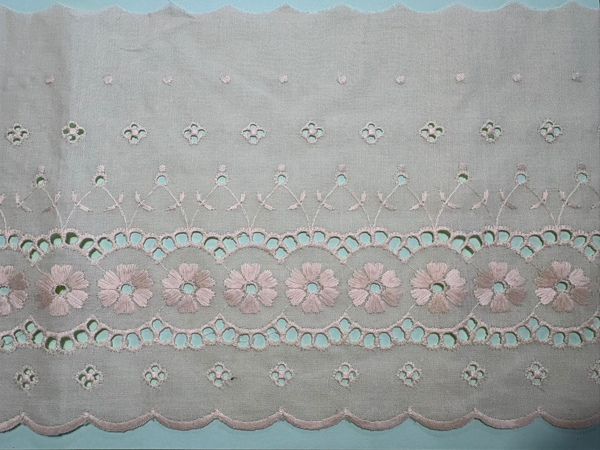 Cream broderie anglaise lace with delicate floral embroidery and scalloped edge, 200mm wide
