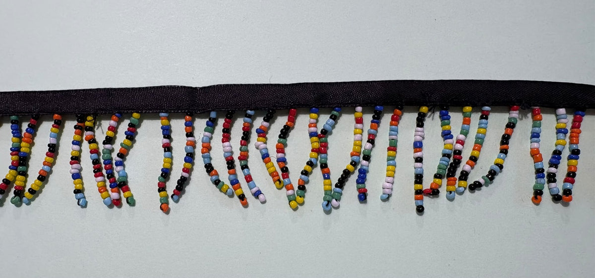 Multicoloured beaded fringe ribbon trim with rows of colourful beads on a black woven header, 40mm wide