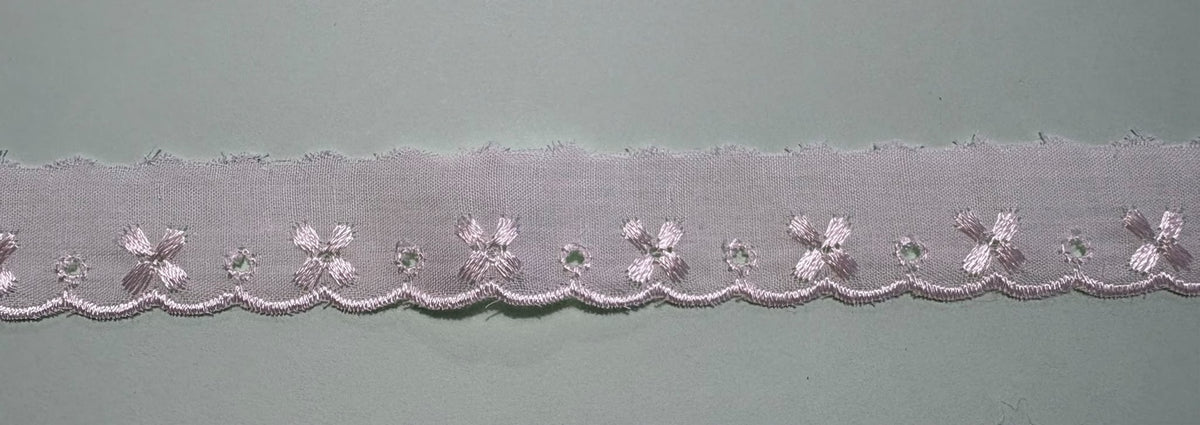 Cream broderie anglaise lace trim with embroidered floral detail and scalloped edge, 25mm wide