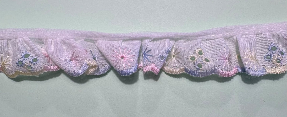 White and pastel broderie anglaise gathered cotton lace trim with embroidered floral details, 25mm wide