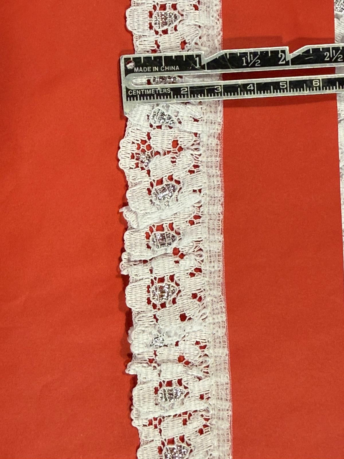 Gathered white and silver lace, 30mm wide