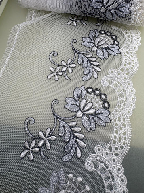 Black and ivory statement floral couture lace on fine netting